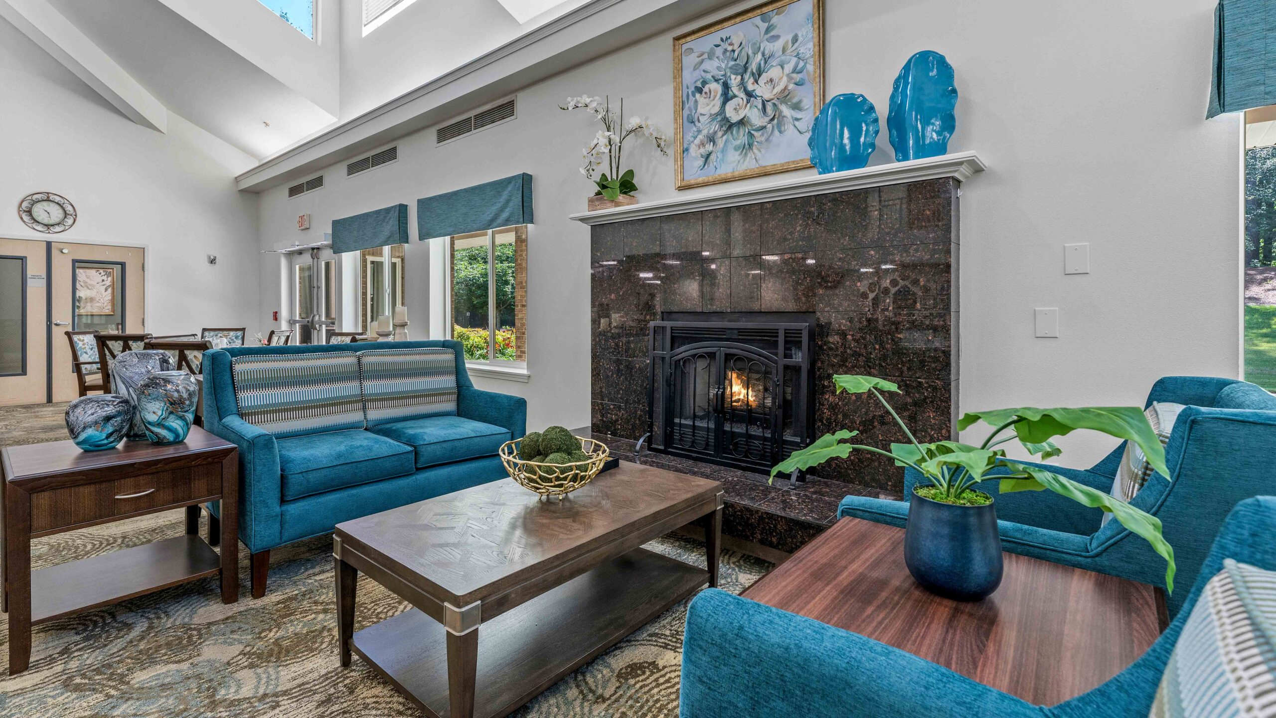 A cozy fireplace lounge at Jordan Oaks